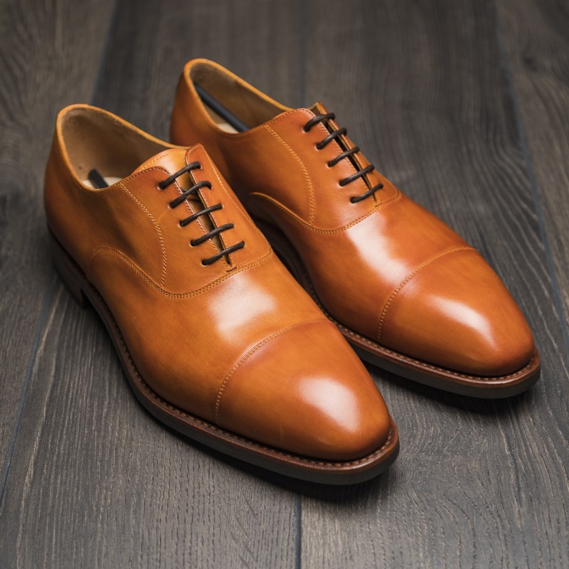 tan cap toe shoes