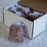 Box with five pack small cedar sachets, one outside