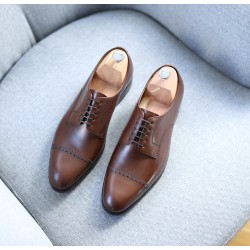 Brogued cap toe derby mørk brun